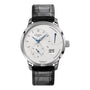 The PanoReserve by Glashütte Original is a luxury watch featuring a white dial, black leather strap, blue hands, date display, power reserve indicator, and two subdials—a modern piece from the esteemed Pano Collection.