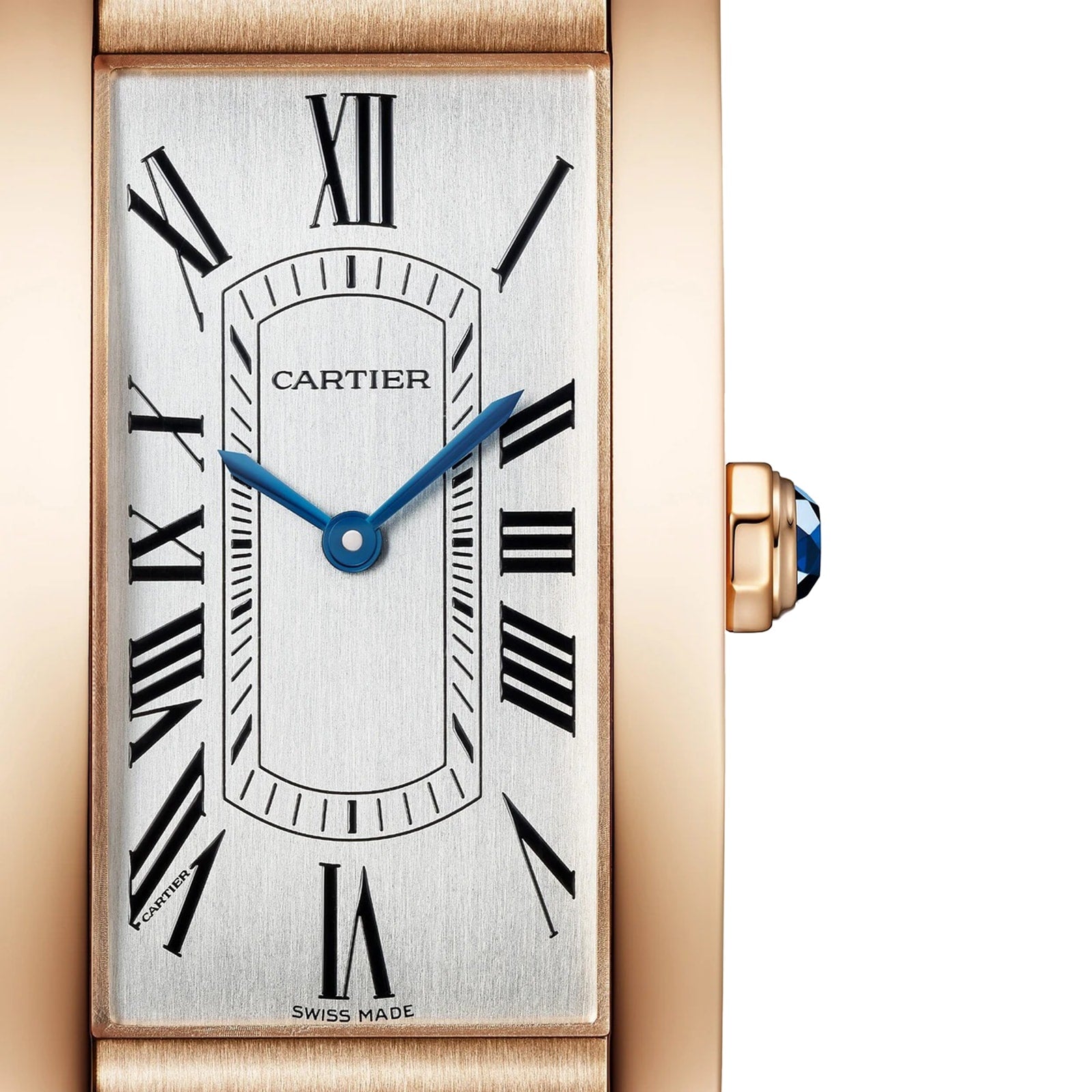 Close-up of the Cartier Tank Américaine watch featuring Roman numerals, blue hands, a crown with blue gem, and an elegant rose gold case.
