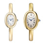 Two Cartier Baignoire gold oval wristwatches feature white faces with black Roman numerals, displayed on a plain white background.