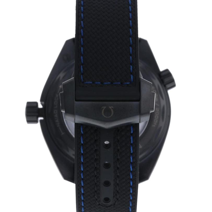 Black OMEGA Seamaster Planet Ocean 600M wristwatch shown from the back, featuring a textured leather strap with blue stitching and a metallic buckle—crafted for style and durability.