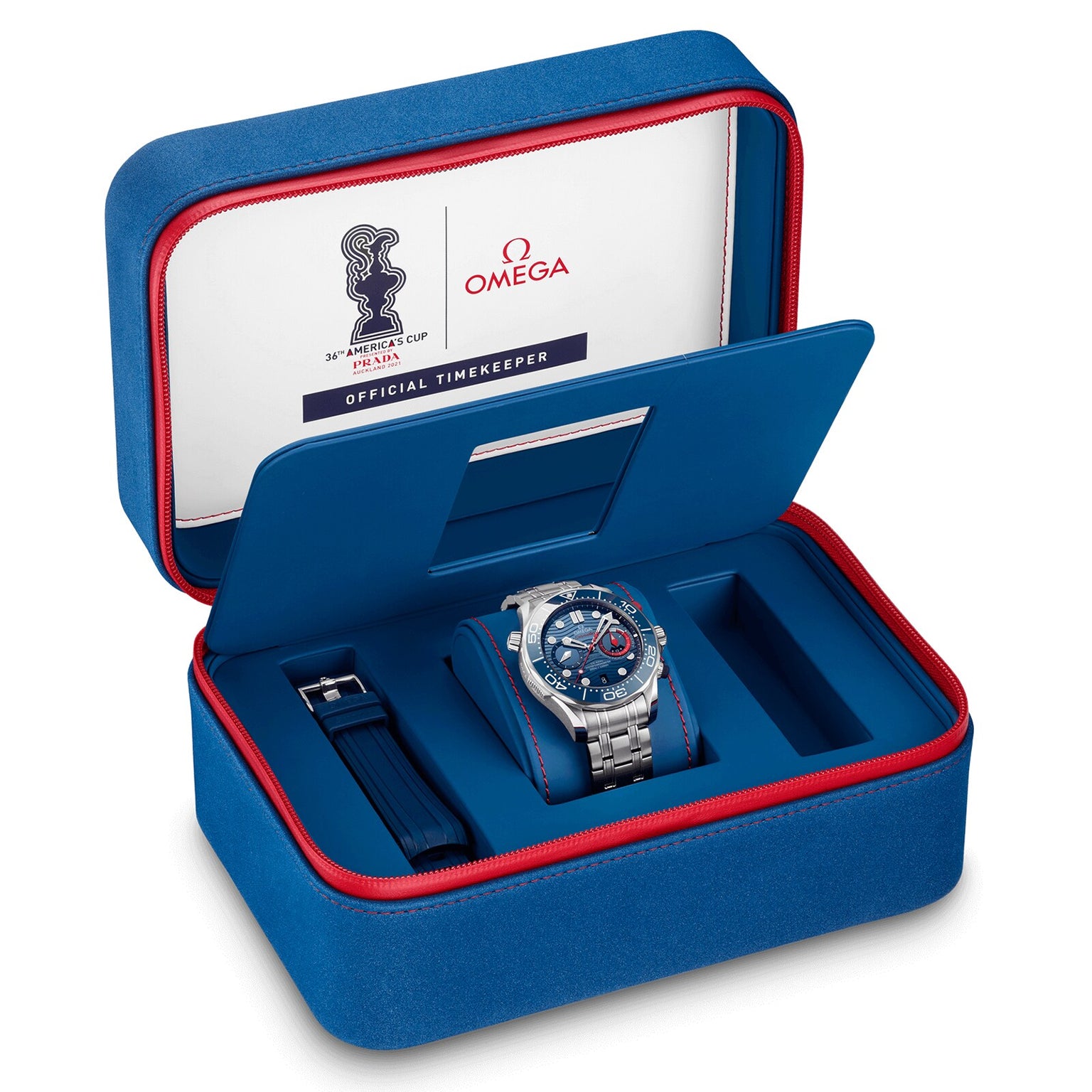 An OMEGA Seamaster Diver 300M Americas Cup Edition in a blue case with red trim, includes a silver and blue wristwatch, extra strap, and America’s Cup branding inside the lid.