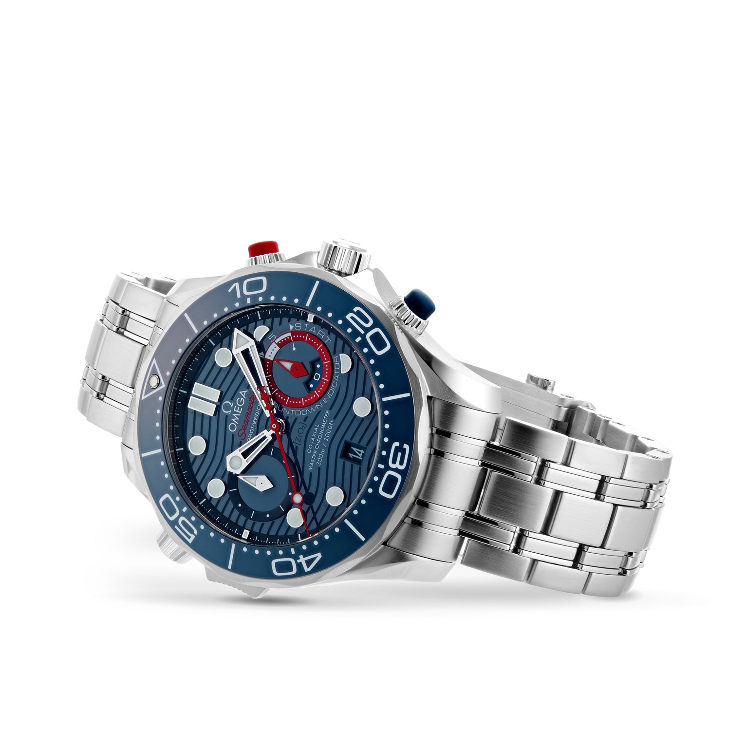 An OMEGA Seamaster Diver 300M Americas Cup Edition wristwatch with a stainless steel case, blue patterned dial, chronograph subdials, and silver bracelet is angled on a white background.