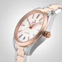 A close-up of an OMEGA Seamaster Aqua Terra 150M wristwatch with a silver and Sedna™ gold metal band, white dial, and rose gold markers and bezel.