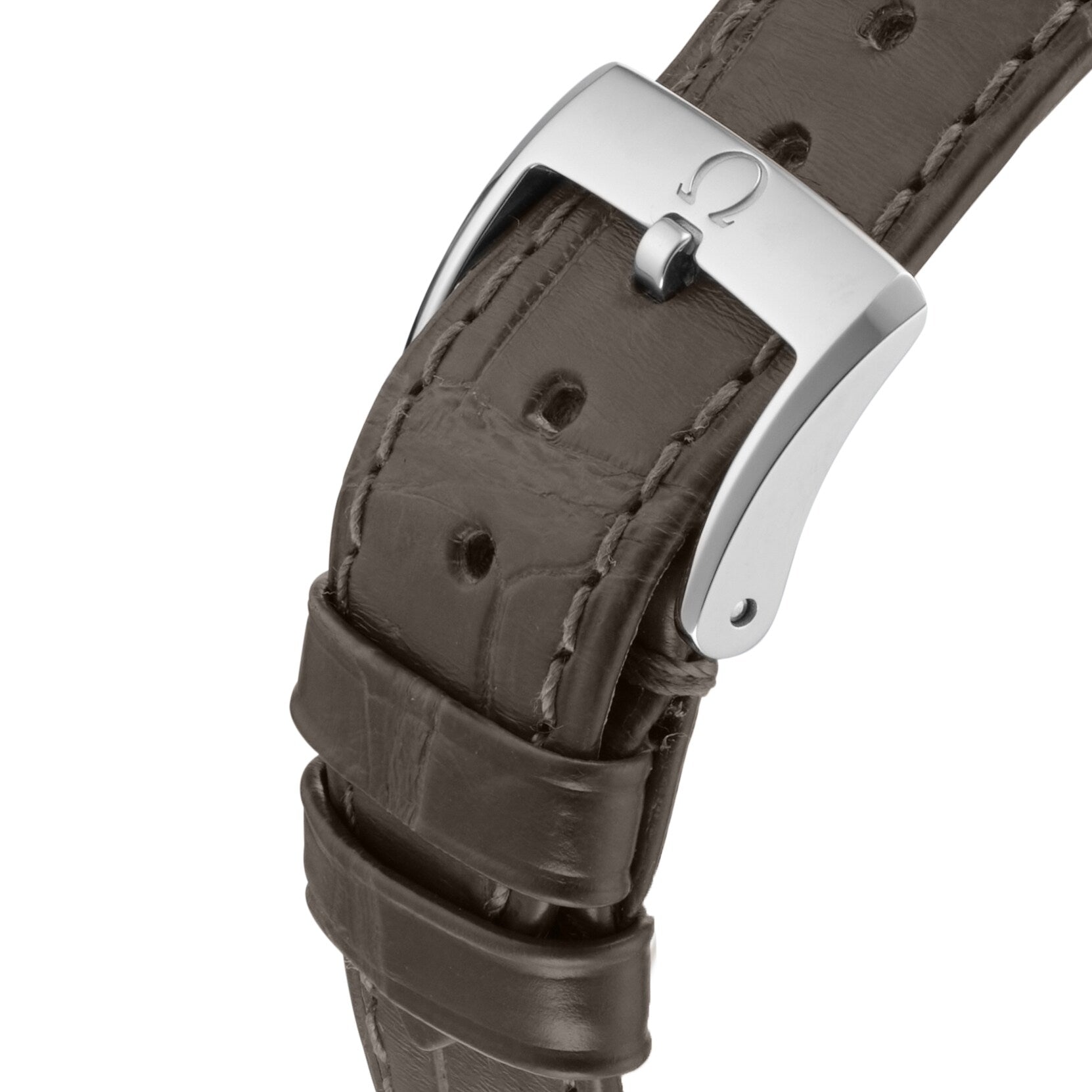 Close-up of a brown leather watch strap with a stainless steel buckle, engraved with the OMEGA logo—crafted for the elegant De Ville Trésor.