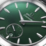 Close-up of a green OMEGA Seamaster Aqua Terra 150M watch face with silver hour markers, hands, sub-dial at 6 o’clock, date window, and powered by the precision 8802 calibre movement.