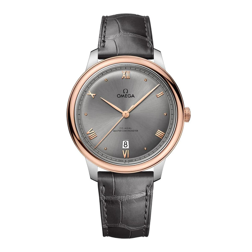 The OMEGA De Ville Prestige features a grey dial, rose gold bezel, black leather strap, date display at 6 o’clock, and visible branding on the dial.