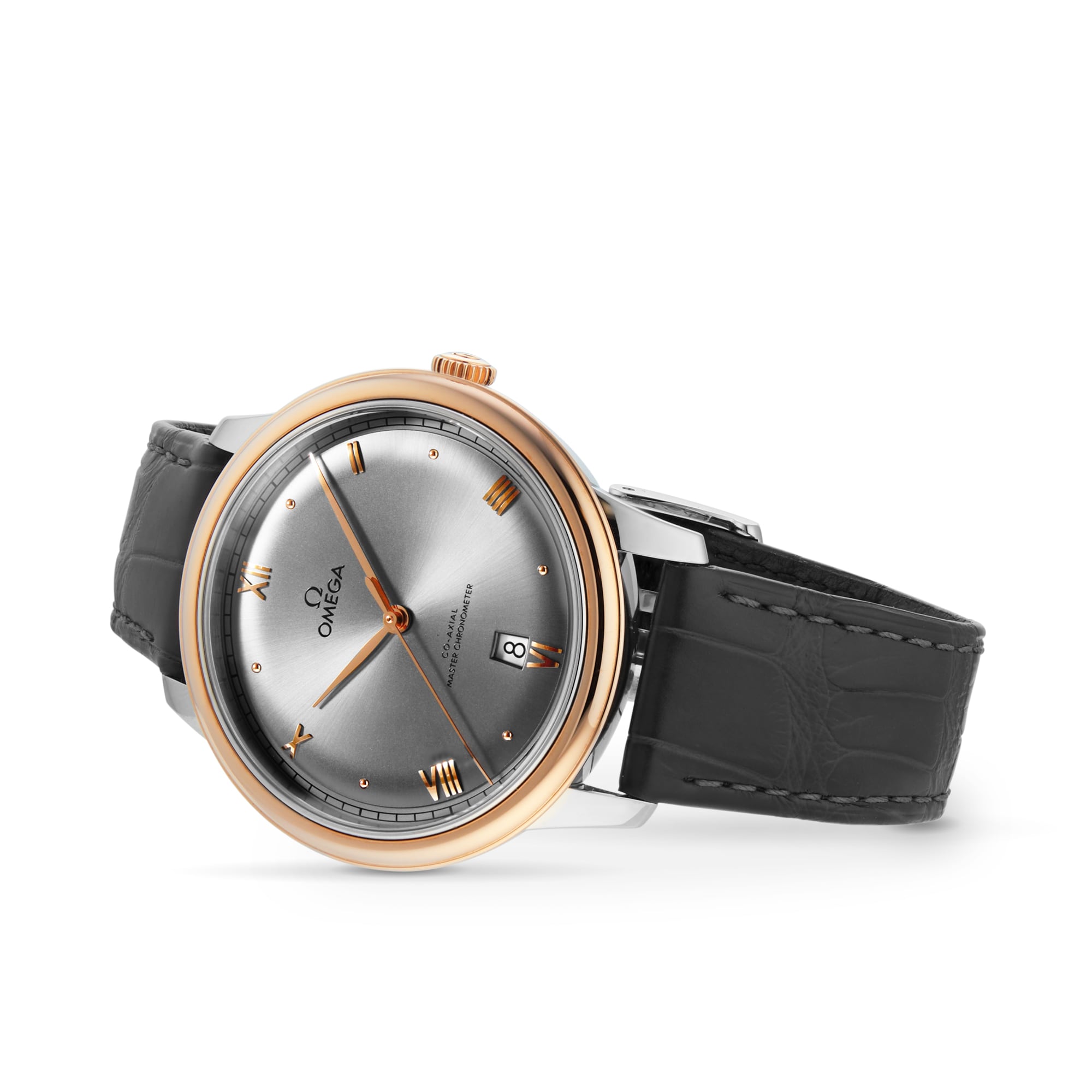 The OMEGA De Ville Prestige features a silver dial, rose gold-tone bezel and crown, black leather strap, date at 3 o’clock, and gold hour markers—offering timeless luxury and refined elegance.