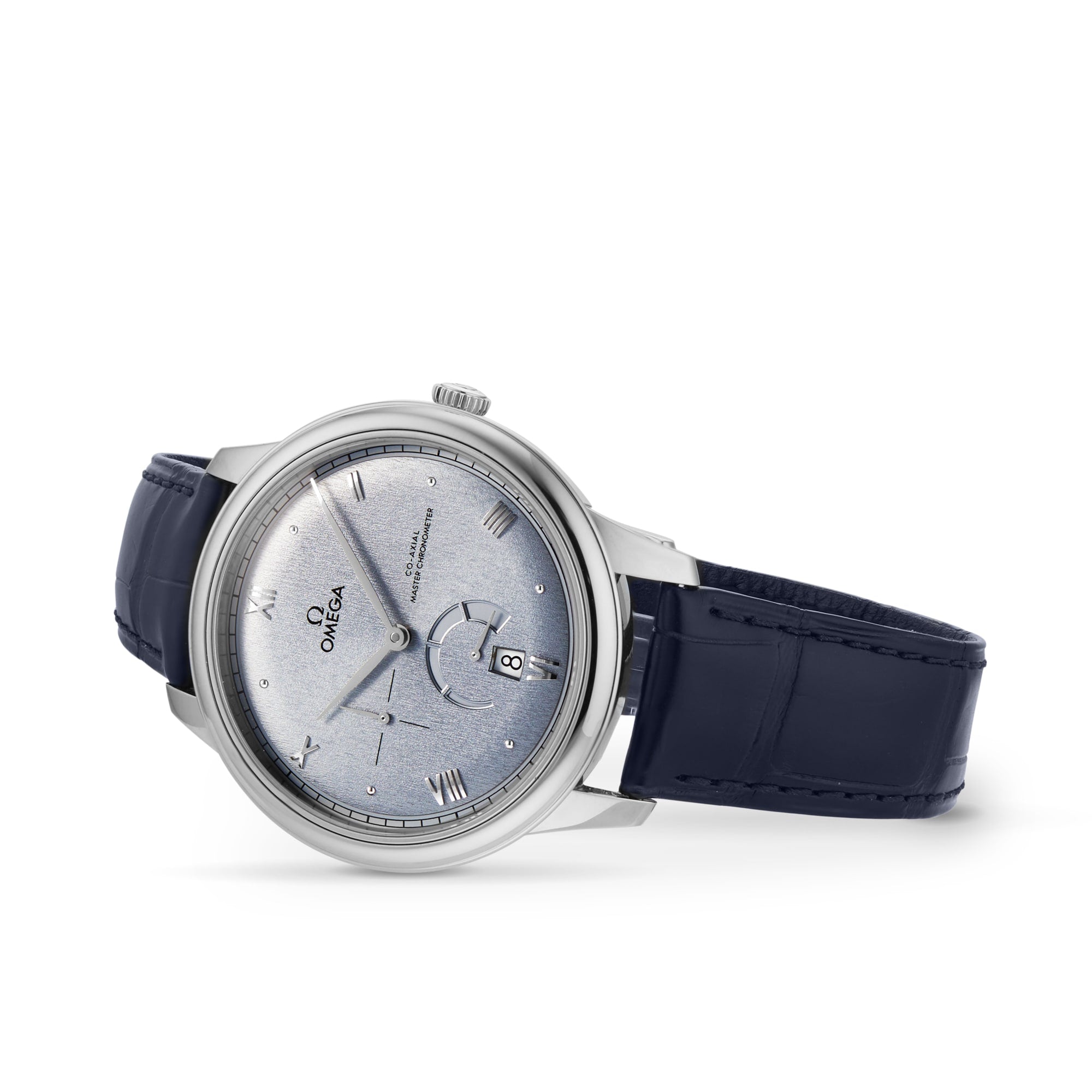 The OMEGA De Ville Prestige wristwatch features a blue leather strap, Roman numerals, date display, and stainless steel case. Angled on a white background, this model epitomizes Master Chronometer elegance.