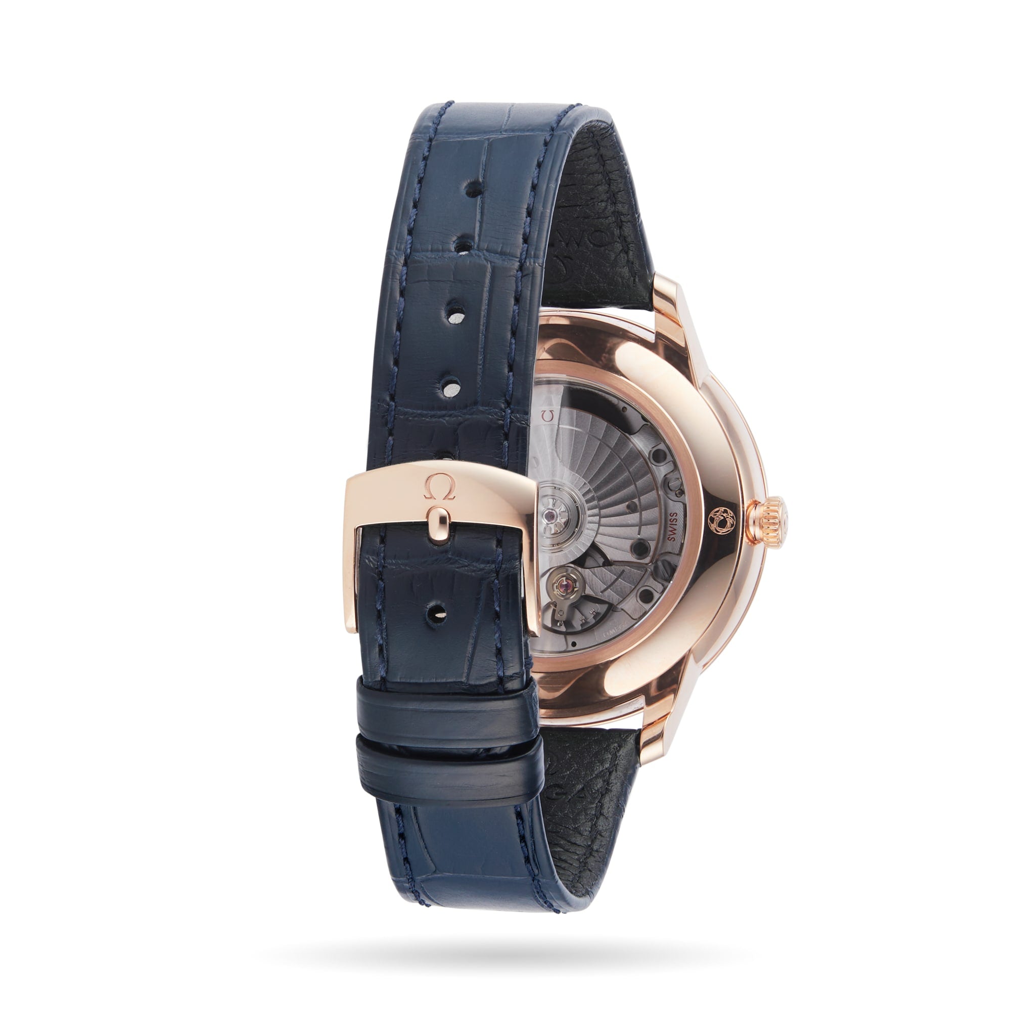 The OMEGA De Ville Prestige wristwatch features a blue leather strap and rose gold buckle, showcased from the back to reveal its transparent case and inner mechanics, highlighting OMEGA craftsmanship.