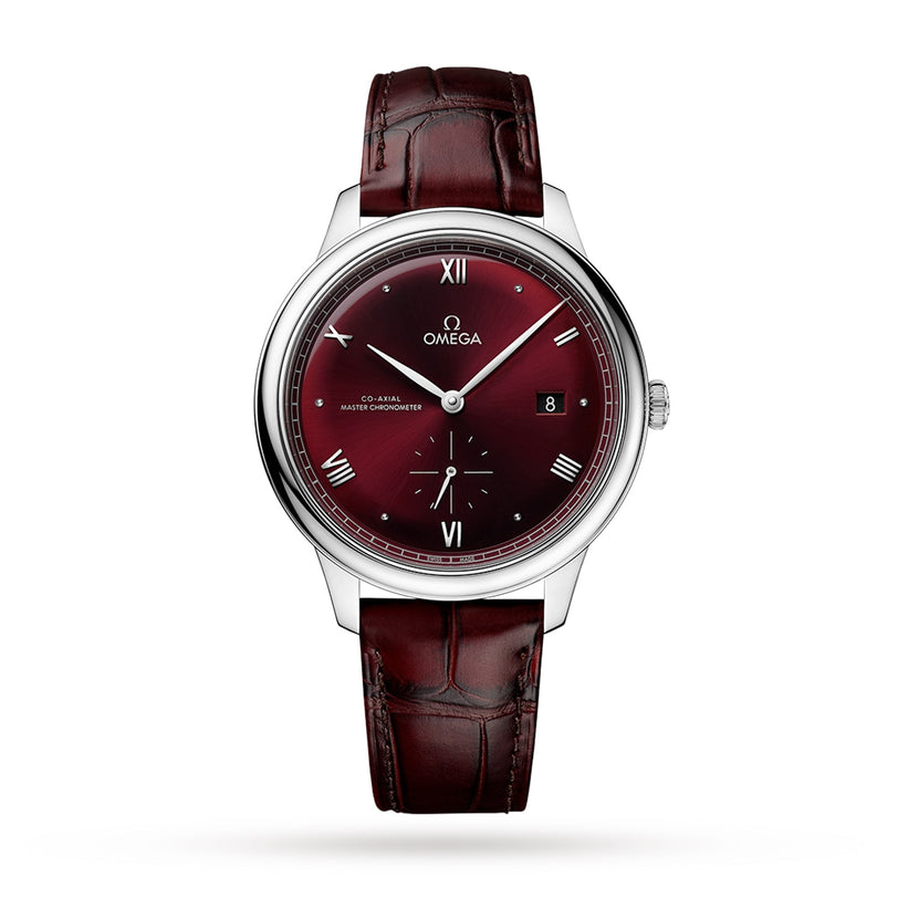 The OMEGA De Ville Prestige features a burgundy dial, leather strap, silver hour markers with Roman numerals, a date window at 3 o’clock, and is powered by the OMEGA Master Co-Axial Calibre 8802.