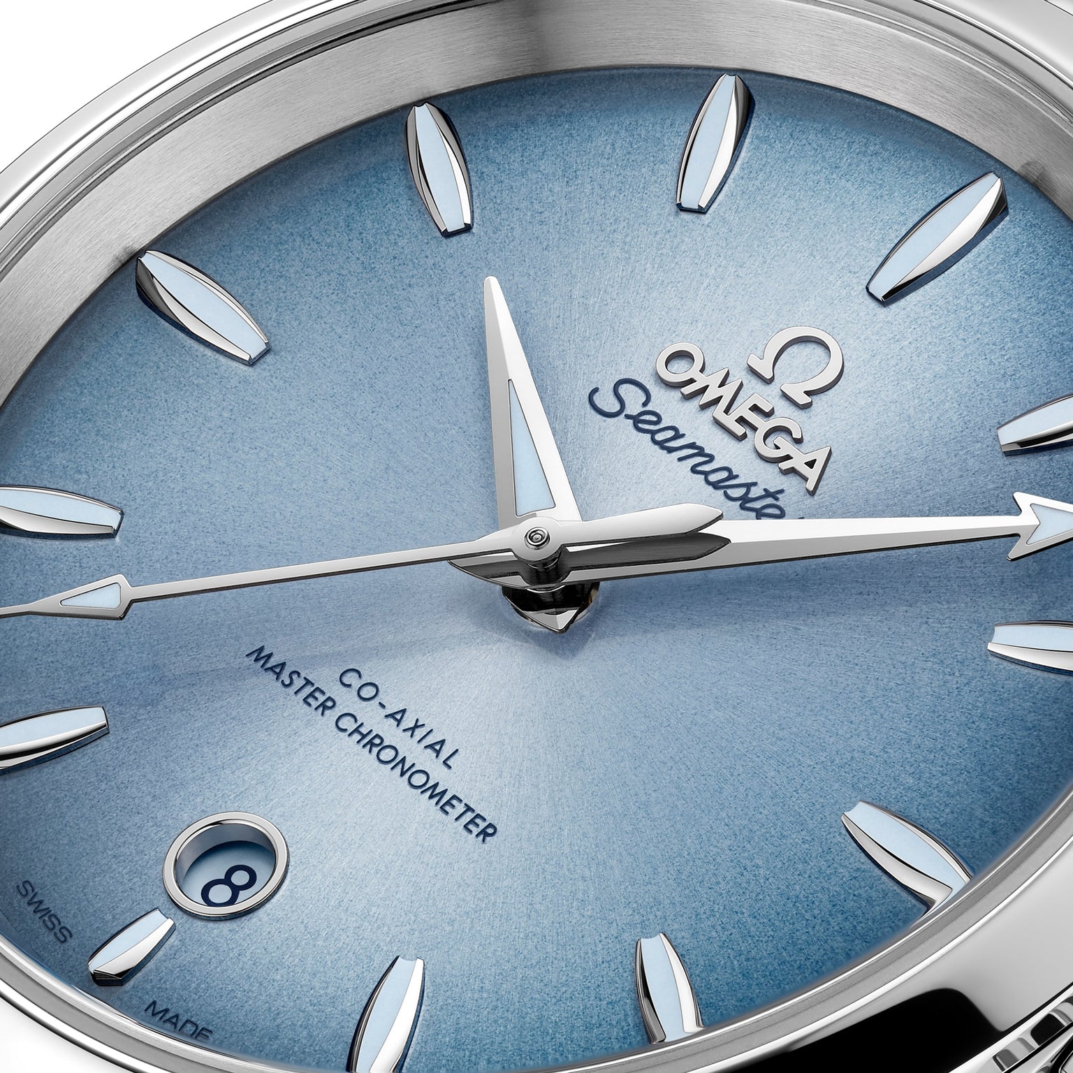 Close-up of the OMEGA Seamaster Aqua Terra 150M, featuring a light blue dial, silver hands and hour markers, date window at 6 o’clock, and reflecting OMEGA’s maritime heritage as a certified Master Chronometer.