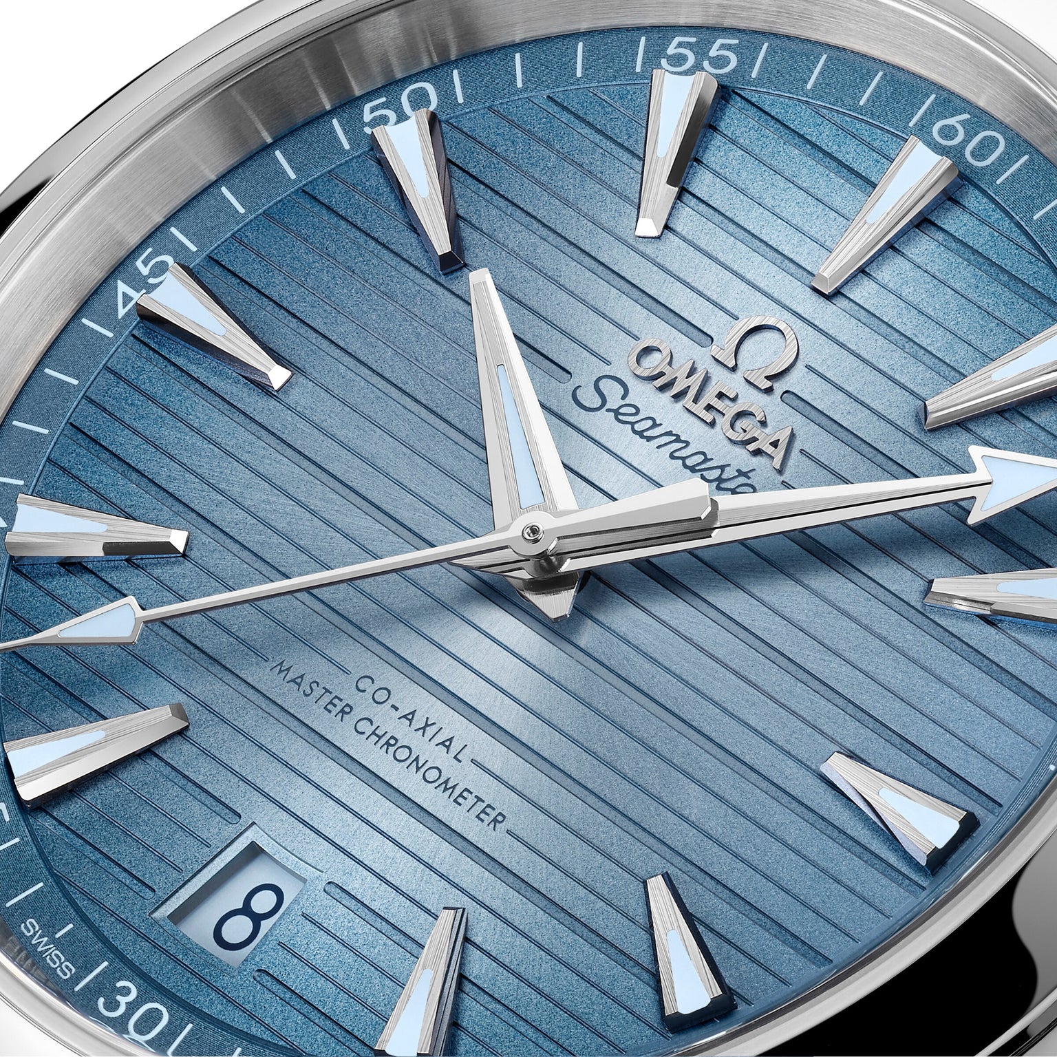 Close-up of the OMEGA Seamaster Aqua Terra 150M watch face featuring a blue textured dial, silver hour markers, a date window at 6 oclock, and three silver hands—Master Chronometer certified for exceptional precision.