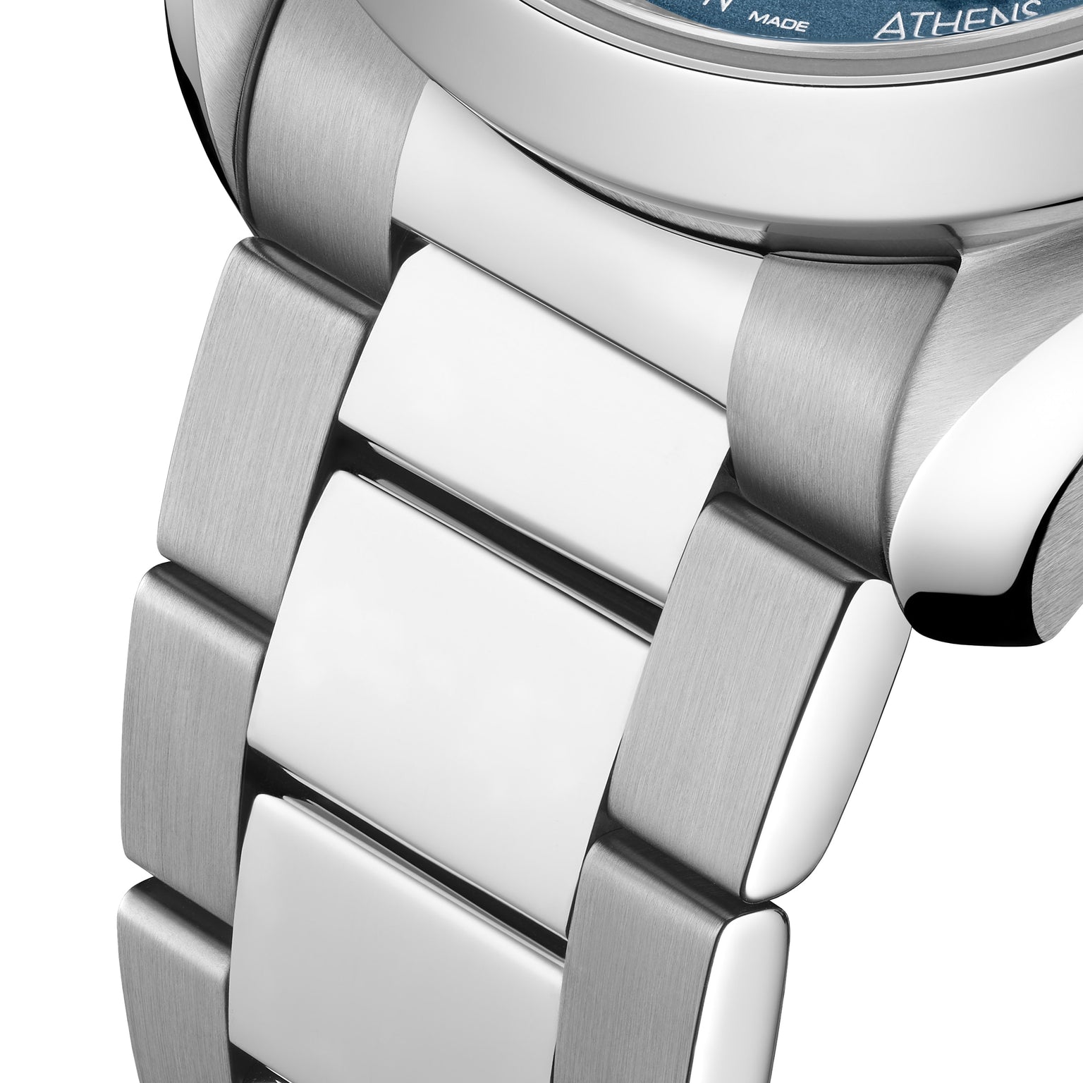 Close-up of an OMEGA Seamaster Aqua Terra 150M’s stainless steel bracelet with brushed and polished links, attached to its stainless steel case, and part of its blue Worldtimer dial visible.