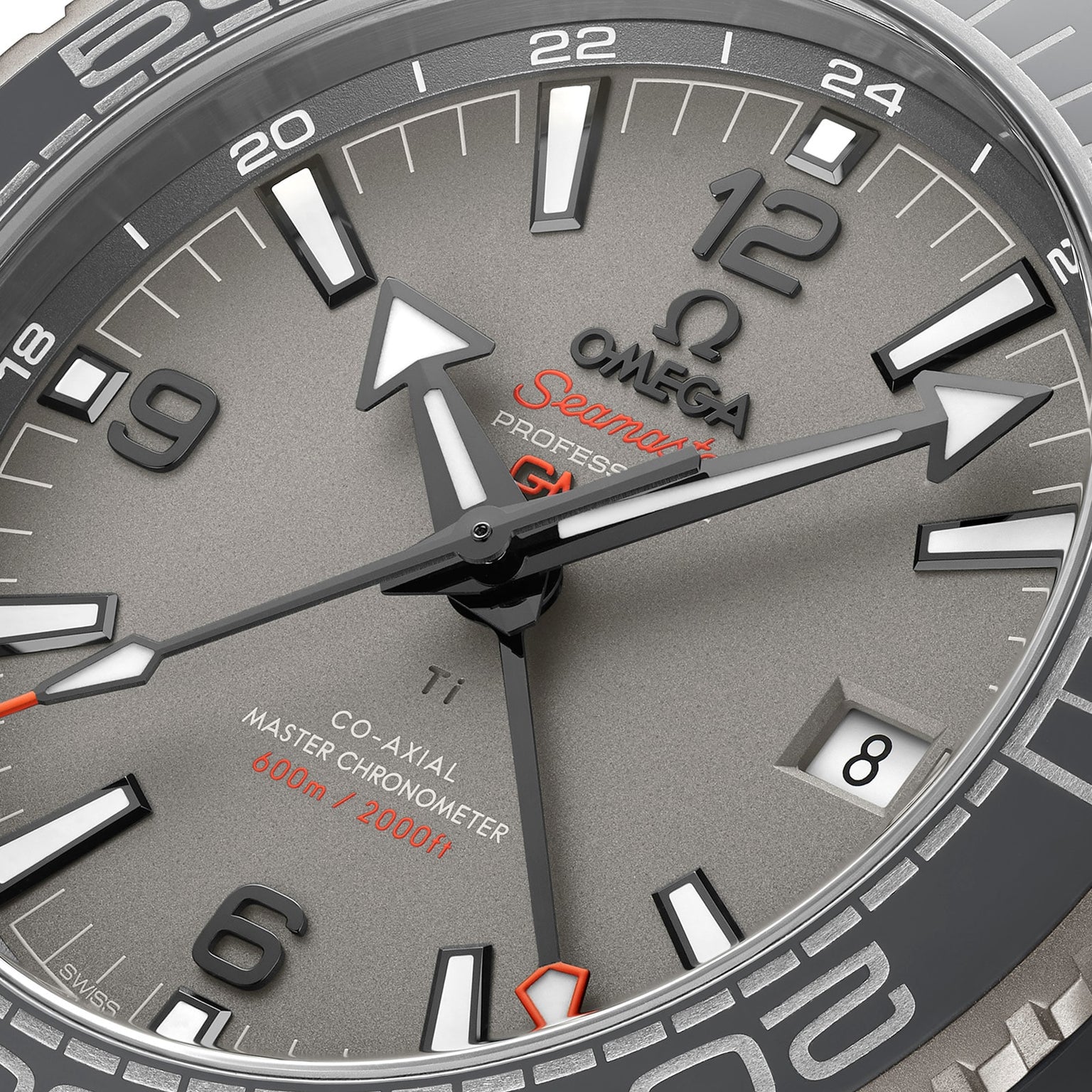Close-up of the OMEGA Seamaster Planet Ocean 600M watch with a grey dial, bold markers, date at 3 o’clock, and 600m/2000ft water resistance—a certified Master Chronometer ready for deep-sea exploration.