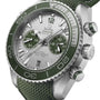 Close-up of the OMEGA Seamaster Planet Ocean 600M, featuring a green bezel and strap, two subdials on a silver dial, Co-Axial Master Chronometer movement, and a date display at 6 o’clock.