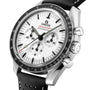 Close-up of an OMEGA Speedmaster Moonwatch Professional featuring a white dial, black tachymeter bezel, chronograph subdials, and a black perforated leather strap.