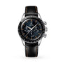 An OMEGA Speedmaster First OMEGA in Space watch with a black leather strap, silver case, black dial, three subdials, and tachymeter scale is displayed on a white background.