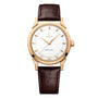 A gold OMEGA Seamaster Moonshine wristwatch with a white dial, gold hands and indices, and a brown leather strap, displayed on a white background—an elegant tribute to OMEGA’s Milano Cortina 2026 partnership.