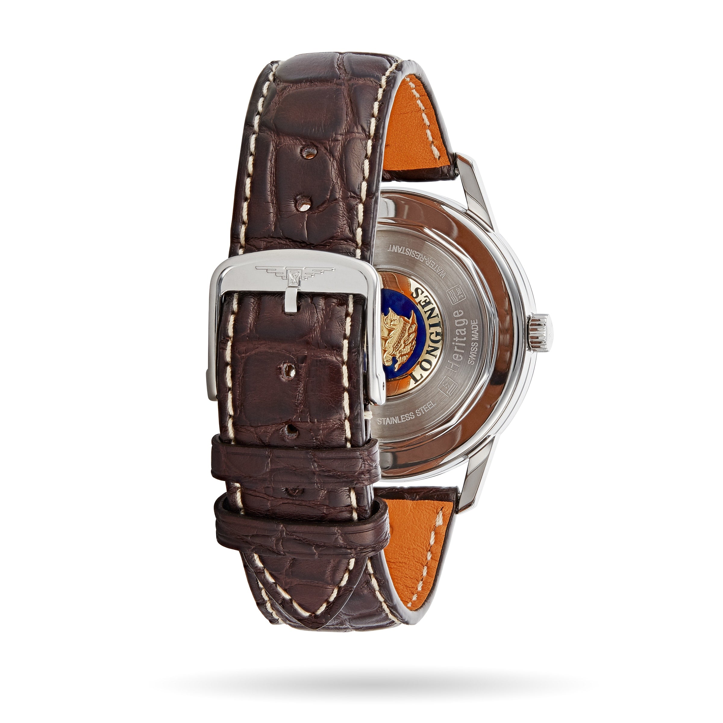 A brown leather strap with a silver buckle is fitted to the Longines Flagship Heritage stainless steel case, shown from the back with visible branding, markings, and the automatic L615 calibre movement.