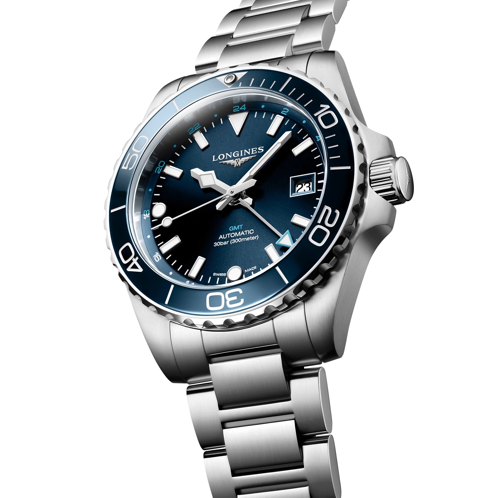 A Longines HydroConquest stainless steel diving watch with a blue dial, date display, rotating bezel, and metal bracelet is displayed at an angle on a white background.