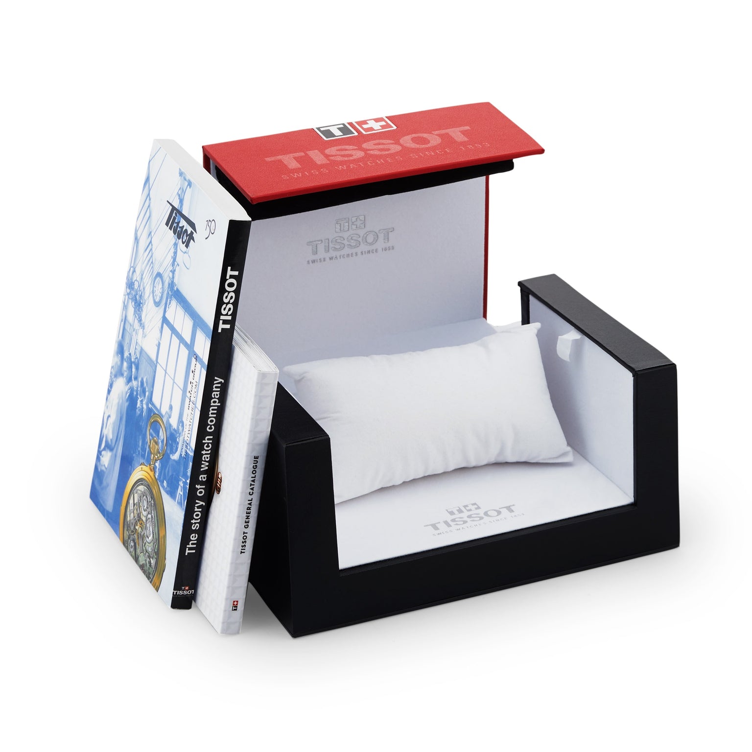 A miniature bed with a pillow, framed by a Tissot headboard and book bedposts, echoes the elegance of the Tissot T-Complication Squelette Mechanical—an imaginative boxed display inspired by luxury watchmaking.