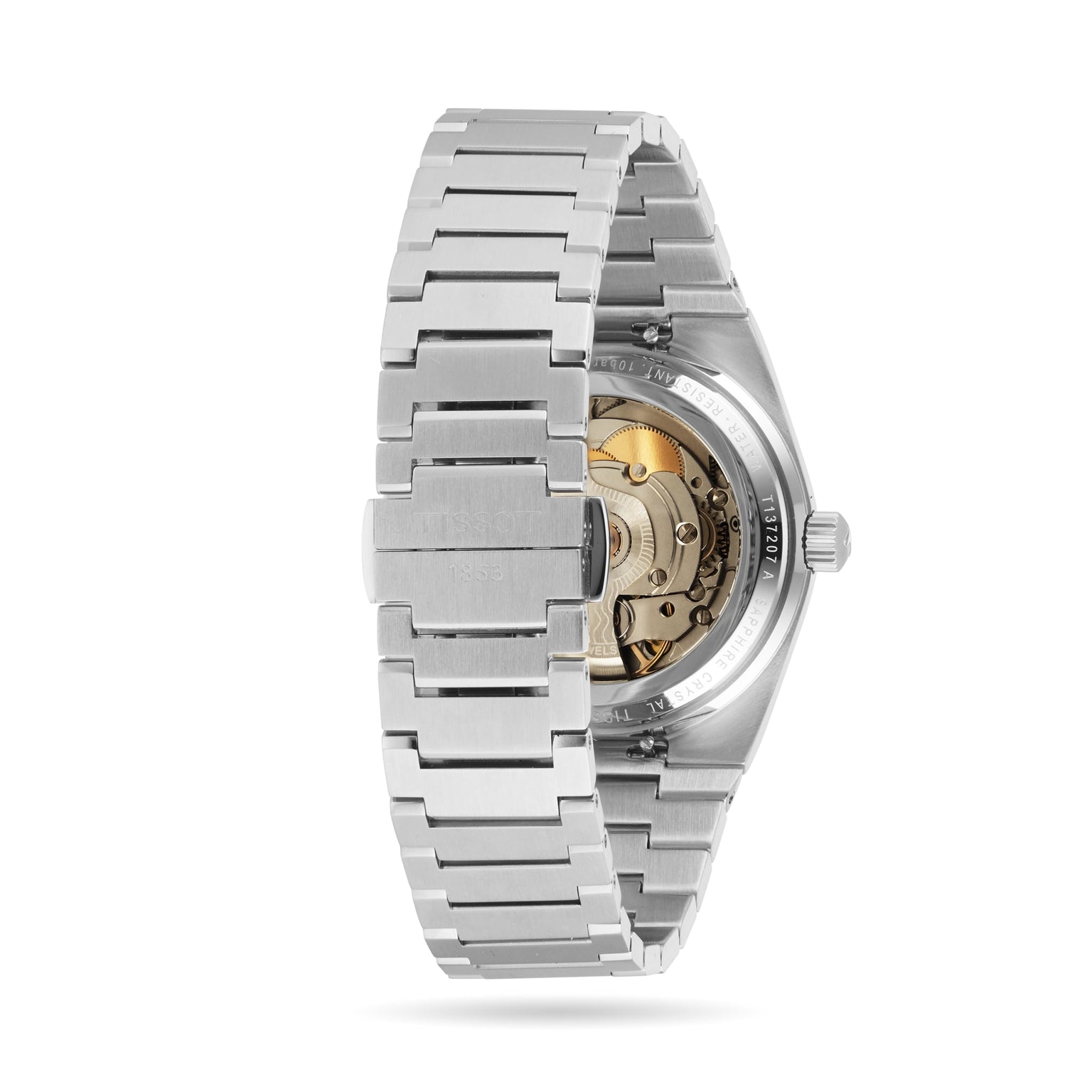 A close-up of the Tissot PRX Powermatic 80 shows its stainless steel bracelet and the automatic movement visible through the transparent case back.