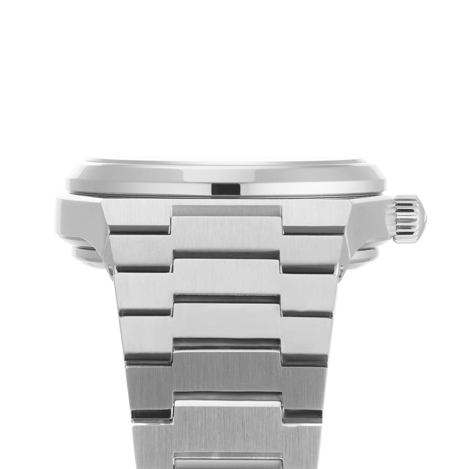 Close-up side view of the Tissot PRX Powermatic 80 wristwatch in stainless steel, featuring a metal link bracelet, visible crown, and elegant waffle-patterned dial on a white background.