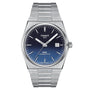 The Tissot PRX Powermatic 80 features automatic movement, a stainless steel case and bracelet, blue textured dial, silver hour markers, sapphire crystal, and a date window at 3 o’clock.