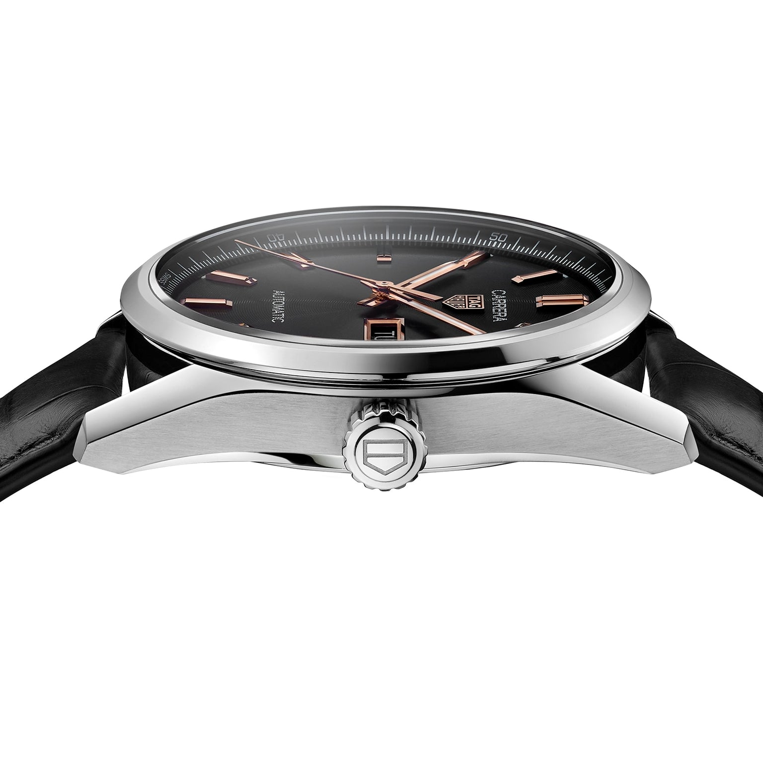 A close-up side view of the TAG Heuer Carrera Day-Date wristwatch highlights its black face, silver case, rose gold hands and indices, and black leather strap, emphasizing its luxurious design.