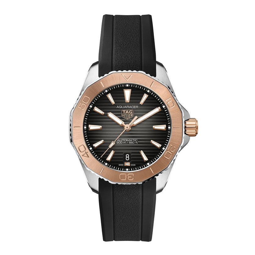 The TAG Heuer Aquaracer Professional 200 sports watch features a black textured dial, date display, two-tone rose gold and silver bezel, black rubber strap, and is powered by the Calibre 5 automatic movement.