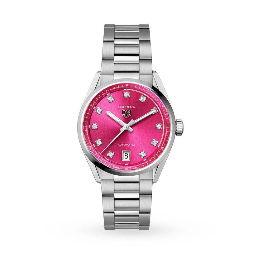 The TAG Heuer Carrera Date features a silver band, a bright pink dial, diamond hour markers, and a date display at the 6 o’clock position.