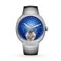 The H. Moser & Cie Streamliner Tourbillon features a blue gemstone dial, a silver case, and a visible tourbillon at the bottom.