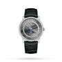 The Blancpain Villeret Quantième Complet is a silver luxury wristwatch with a black leather strap, Roman numerals, and a moonphase display on the dial.