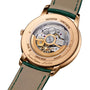 Back view of the limited edition Vacheron Constantin Patrimony Self-Winding in 18K pink gold, showing its mechanical movement, Geneva Seal, green leather strap, and engraved case number.