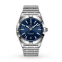 The Breitling Chronomat 32 is a stainless steel wristwatch featuring a blue dial, silver hour markers, COSC-certified SuperQuartz movement, date display at 6 o’clock, and a metal link bracelet, shown on a white background.