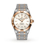 The Breitling Chronomat 32 features a silver and gold two-tone metal band, white dial, gold bezel, and date at 6 o’clock. This COSC-certified chronometer is shown against a plain white background.