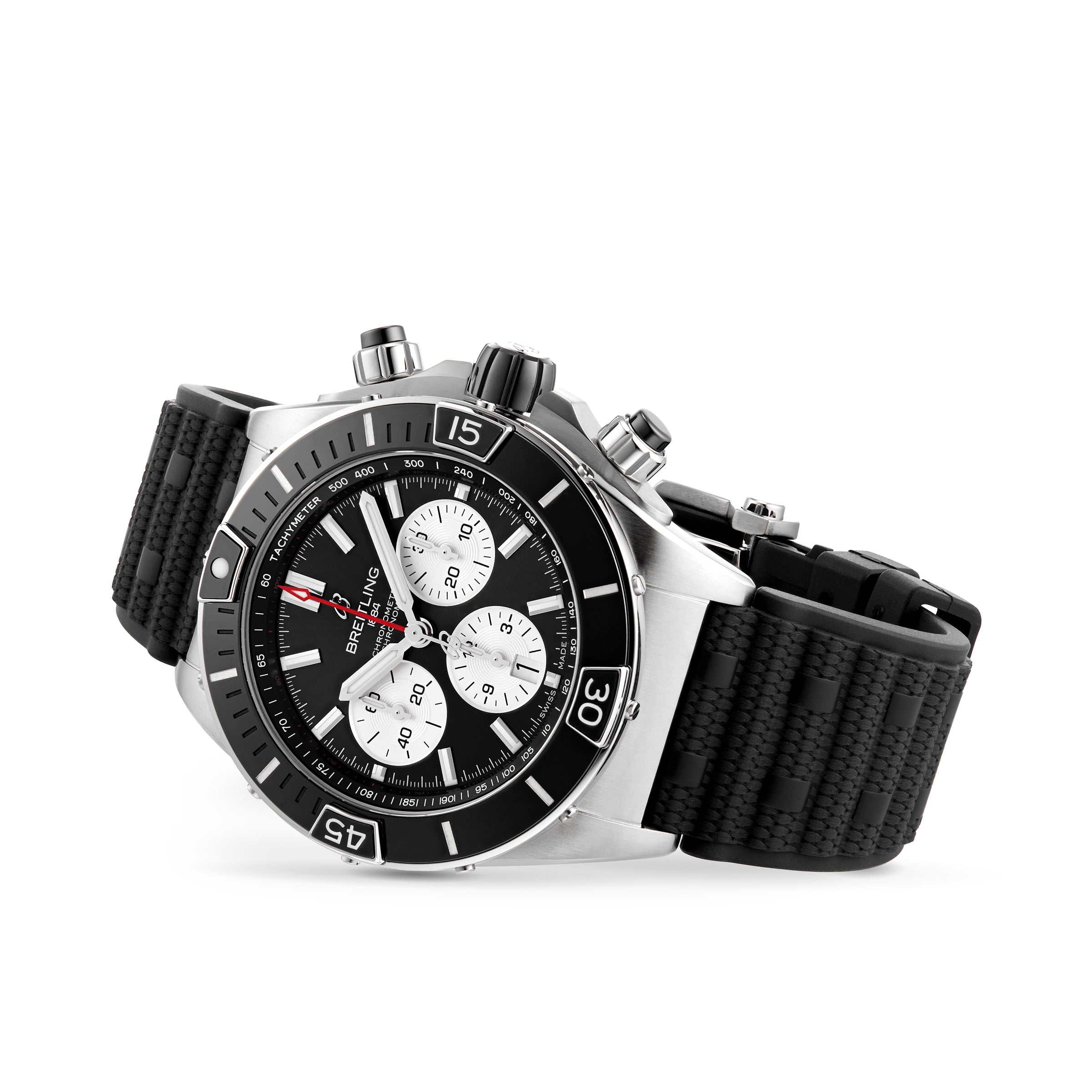 A Breitling Super Chronomat B01 44 chronograph watch in stainless steel, with a black bezel, black dial, three white subdials, and a black textured rubber strap, featuring the COSC-certified Breitling 01 calibre, shown angled on white background.