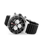 A Breitling Super Chronomat B01 44 chronograph watch in stainless steel, with a black bezel, black dial, three white subdials, and a black textured rubber strap, featuring the COSC-certified Breitling 01 calibre, shown angled on white background.