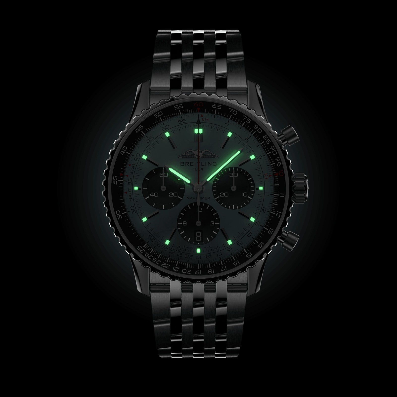 The Breitling Navitimer B01 Chronograph 43 is a black metal pilot’s watch with a chronograph display, glowing green hour markers and hands, powered by the Breitling 01 calibre, shown against a black background.