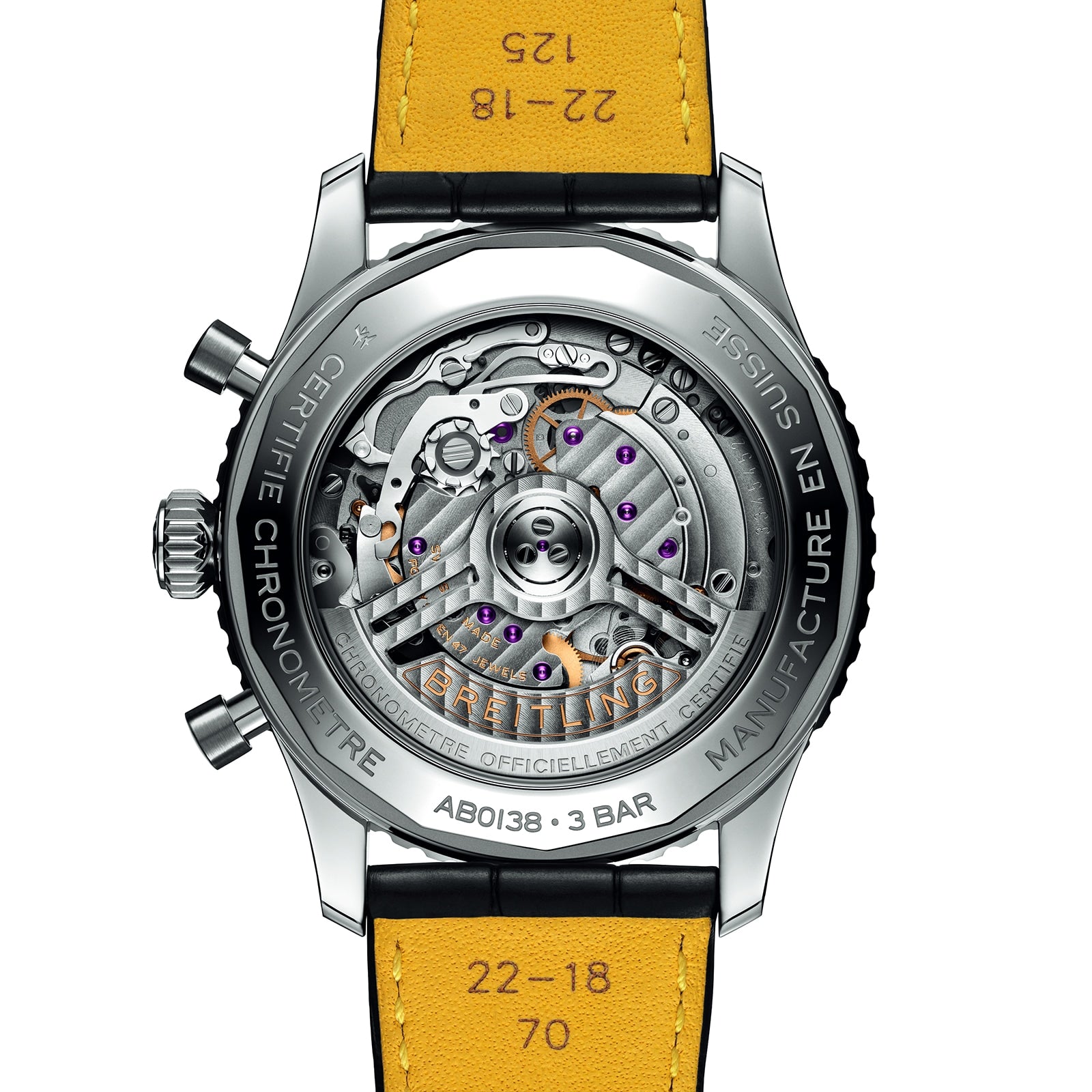 Close-up of the back of a Breitling Navitimer B01 Chronograph 43, revealing its exposed mechanical movement, labeled parts, and a yellow leather strap marked with printed numbers.
