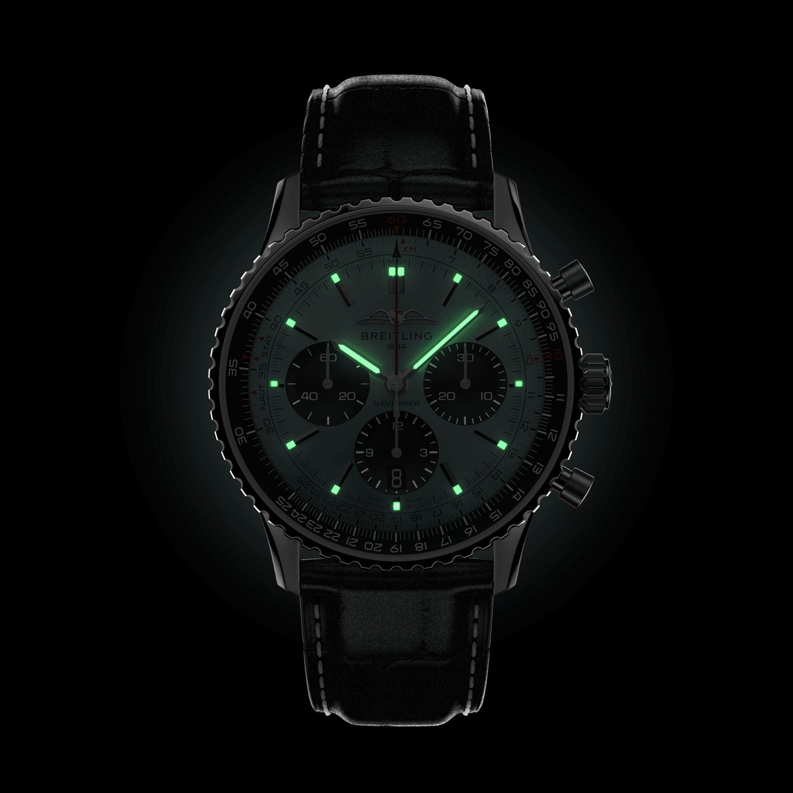 The Breitling Navitimer B01 Chronograph 43 features a black dial with glowing green luminescent markers and hands, complemented by a leather strap.