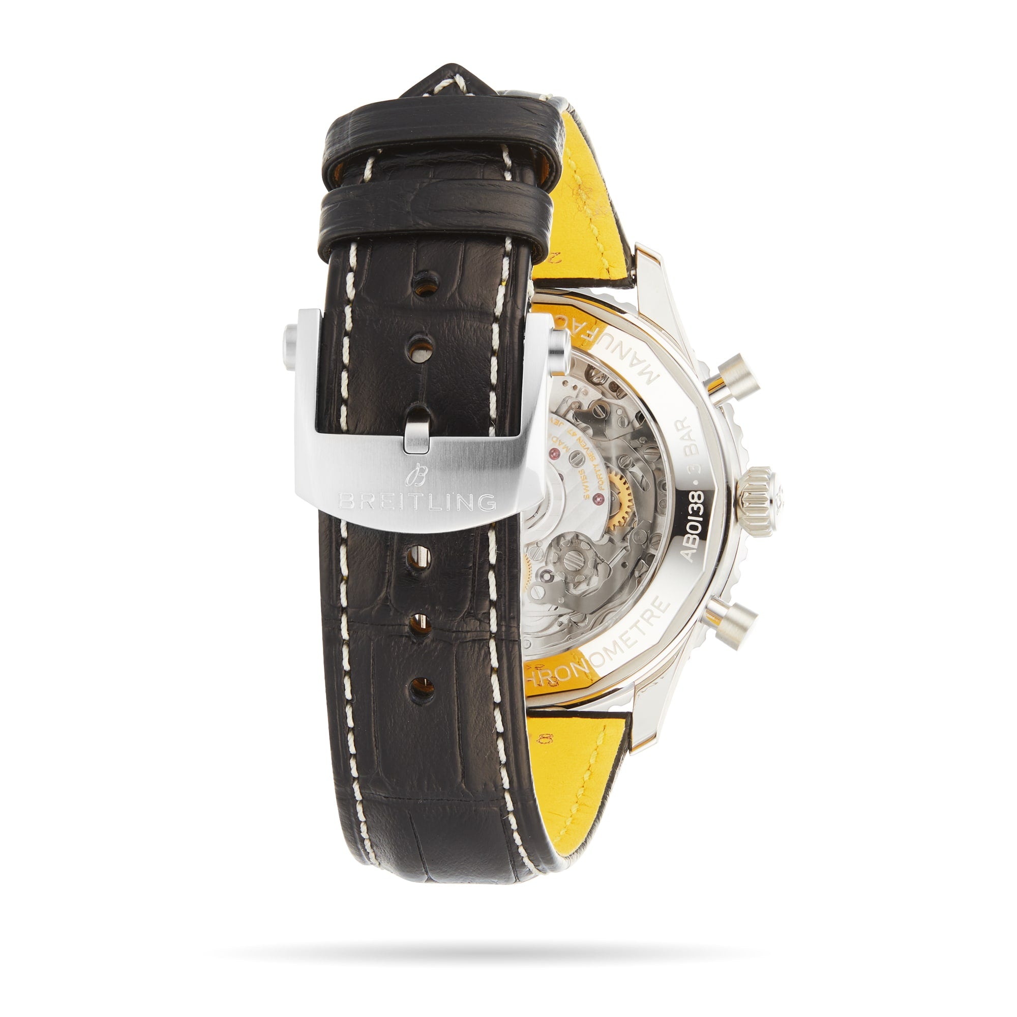 Close-up of the back of a Breitling Navitimer B01 Chronograph 43 wristwatch, featuring a black leather strap with yellow underside, metal buckle, and transparent case back revealing the mechanical chronograph movement.