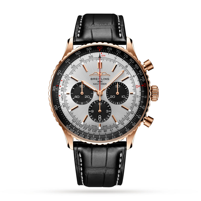 The Breitling Navitimer B01 Chronograph 46 features a gold case, black leather strap, black/silver/white dial with three subdials and date window, powered by the Breitling 01 calibre.