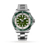 The Breitling Superocean Automatic 44 features a stainless steel case, green bezel and dial, white hour markers, date at 6 oclock, silver link bracelet, and automatic movement, shown against a white background.