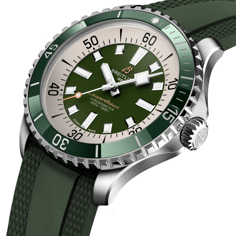 The Breitling Superocean Automatic 44, featuring a green dial, bezel, and rubber strap, is displayed at an angle on a white background. This water-resistant watch blends bold style with reliable performance.