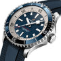 Close-up of the Breitling Superocean Automatic 42 dive watch, featuring a blue dial, white hour markers, rotating bezel, and textured blue strap. Powered by Breitling 17 calibre and water resistant to 300m.