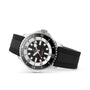 The Breitling Superocean Automatic 46, a stainless steel dive watch with a black and white dial, black bezel, and black rubber strap, is displayed at an angle on a white background.