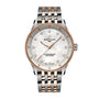 The Breitling Navitimer 32 features SuperQuartz™ movement, a two-tone bracelet, mother-of-pearl dial with diamond hour markers, gold bezel, and three hands.