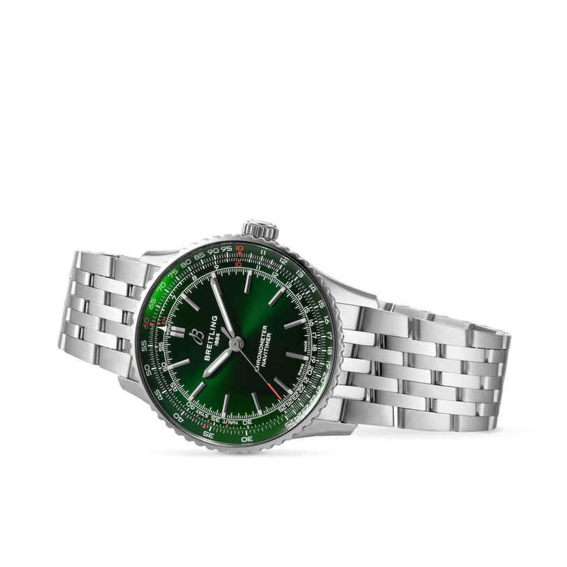 A Breitling Navitimer Automatic 41 featuring a stainless steel case, green dial, silver hour markers, and a metal link bracelet is displayed on a white background.