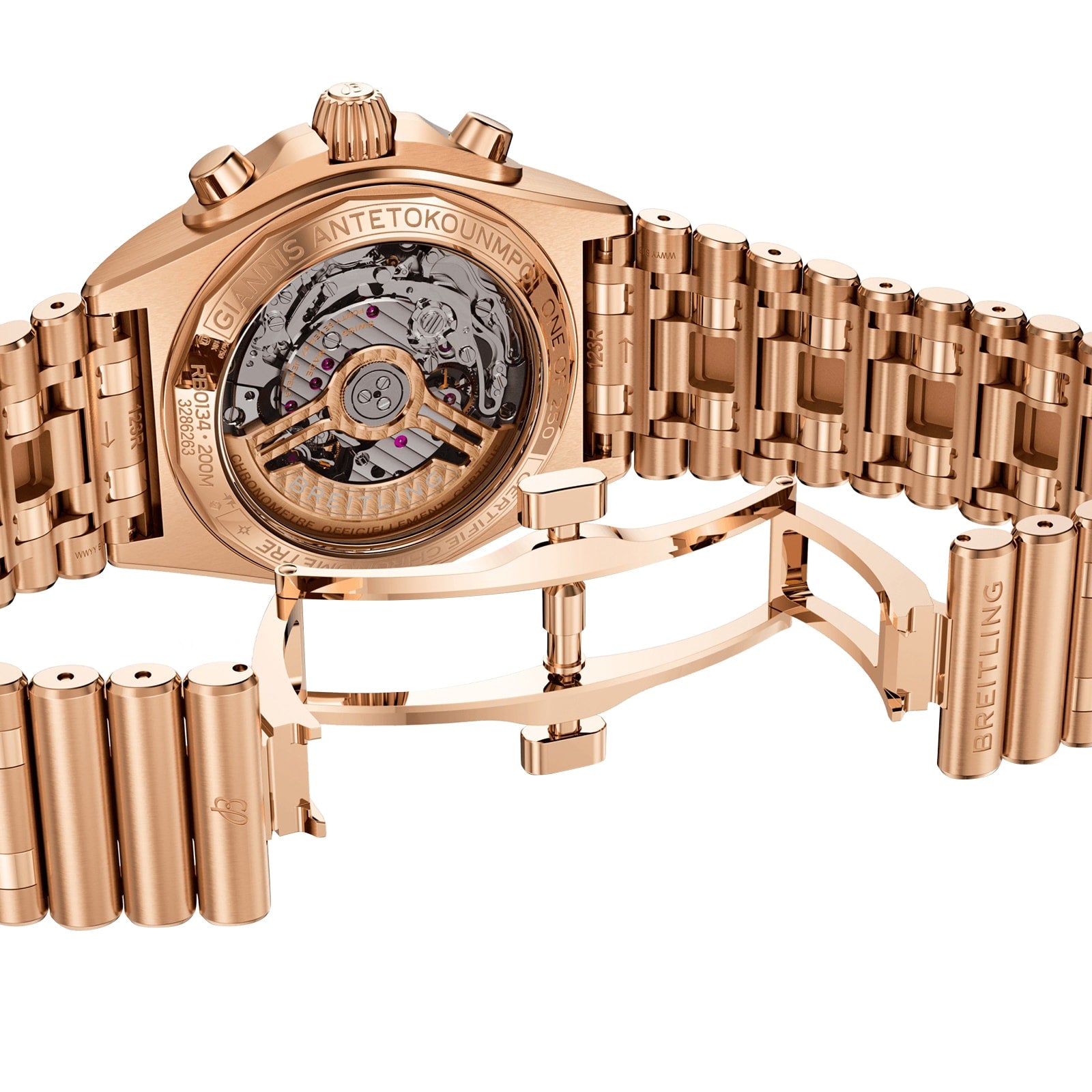 Close-up of the back of a gold Breitling Chronomat B01 42 Giannis Antetokounmpo, featuring an open clasp, intricate mechanical movement, and engraved details on this exclusive limited edition timepiece.